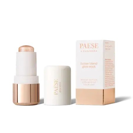 Stick highlighter de color dorado junto a su caja de la marca Paese